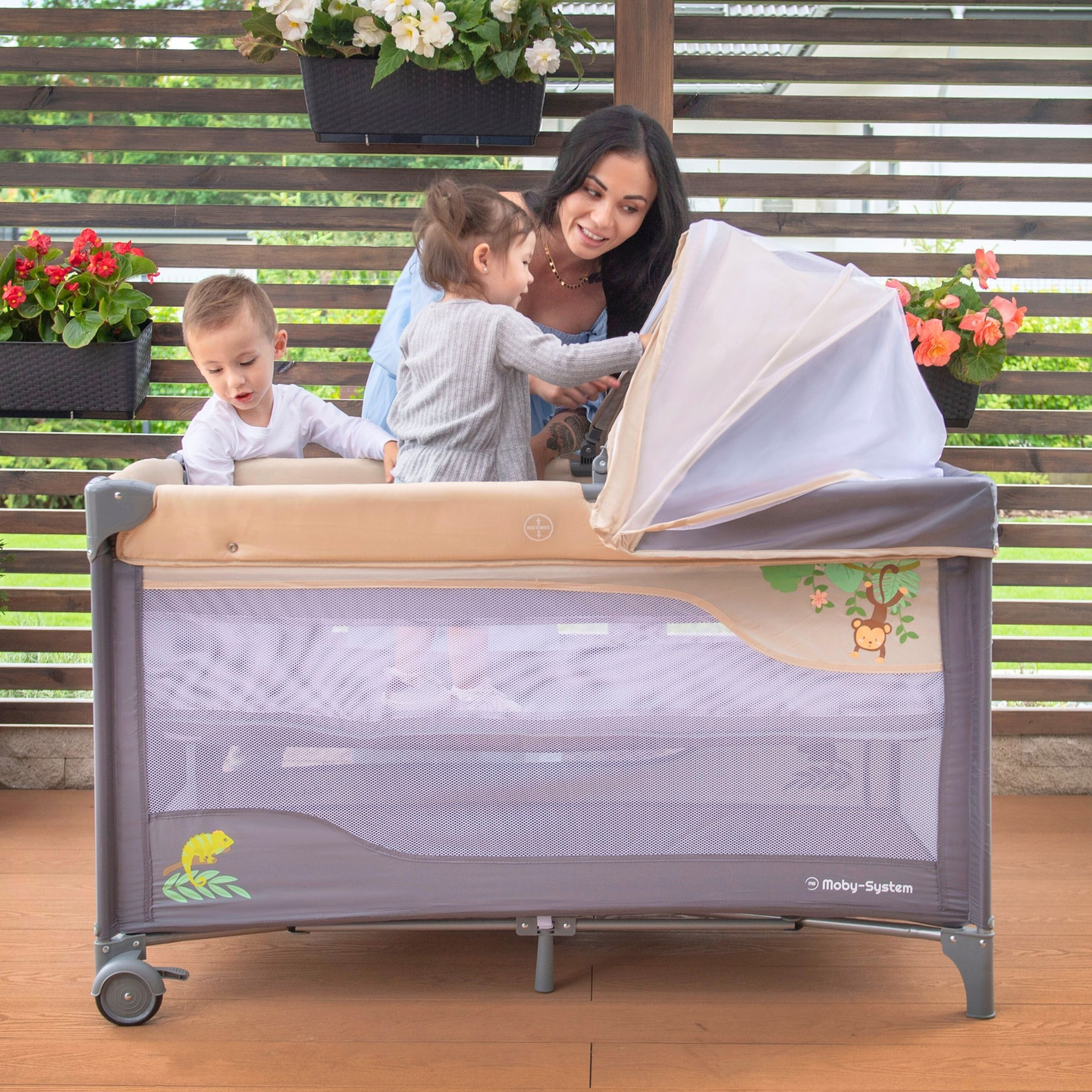 Cestovná postieľka 0 - 36 m s prebaľovacím pultom + ohrádka Moby-System HUXLEY